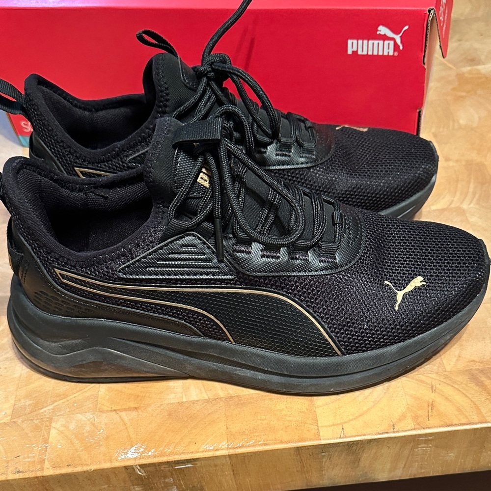 Puma Women’s Athletic Black and Gold Shoes